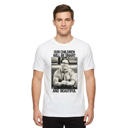 A man wearing a white graphic t-shirt with a black-and-white photo print and the text 'OUR CHILDREN WILL BE SMART AND BEAUTIFUL' on a plain white background.