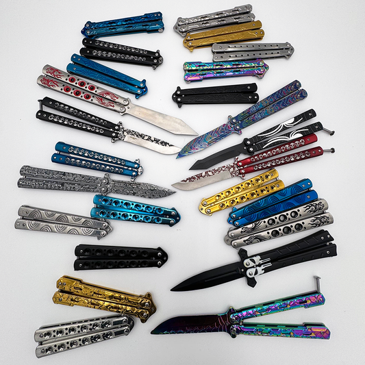 Set of 36 mixed butterfly trainer knives in a display jar, branded Rex Distributor, Inc., with colorful handles and blade tips visible.