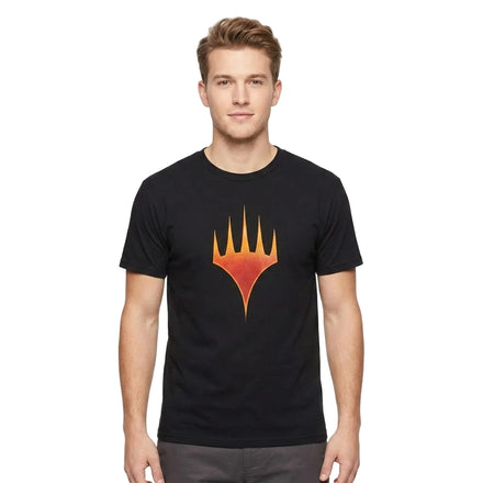 A man wearing a black crewneck t-shirt with a stylized orange and yellow flame-like graphic on the chest, set against a plain white background.