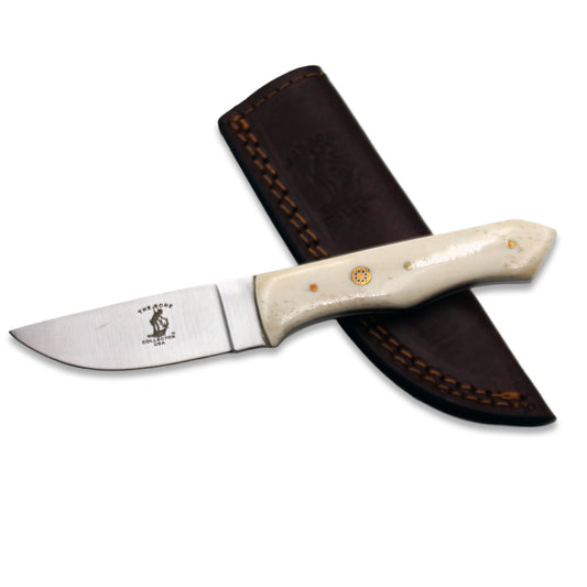 Bone Collector 8-inch white bovine bone handle hunting knife with leather sheath, detailed close-up of the blade and handle.