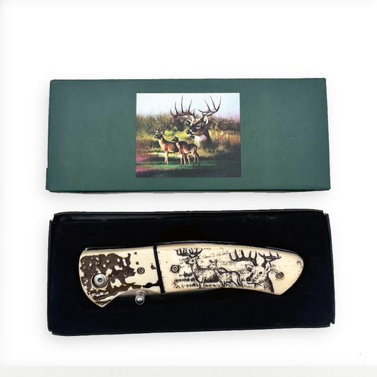 Display set of Rex Distributor's KN 1859-D 4.25-inch sketch wildlife folding knife with belt clip, shown in the image.