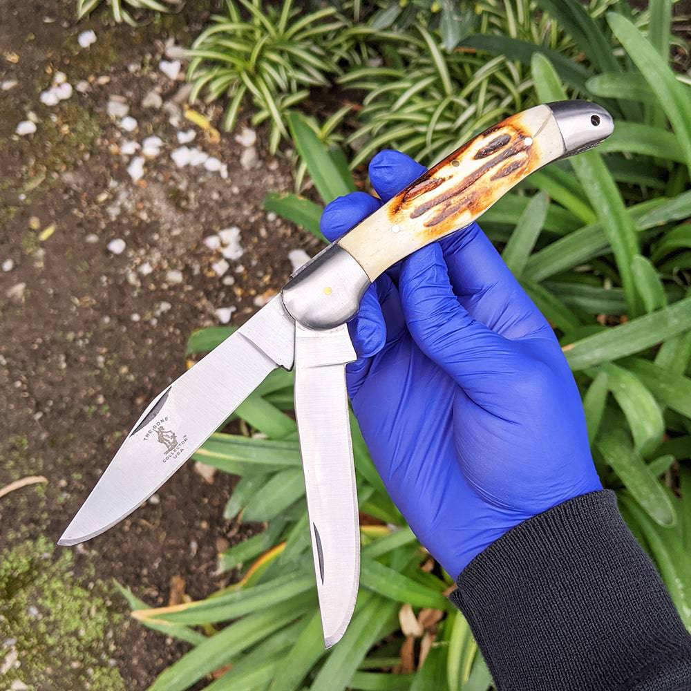 BC 816 5" Bone Collector 2 Blade Bone Handle Folding Knife with Leather Knife - Rex Distributor, Inc. Wholesale Licensed Products and T-shirts, Sporting goods,