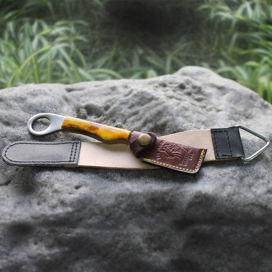 Bone Collector BC 866-YBN 8-inch yellow bone handle razor knife with leather sheath and sharpening strop belt.