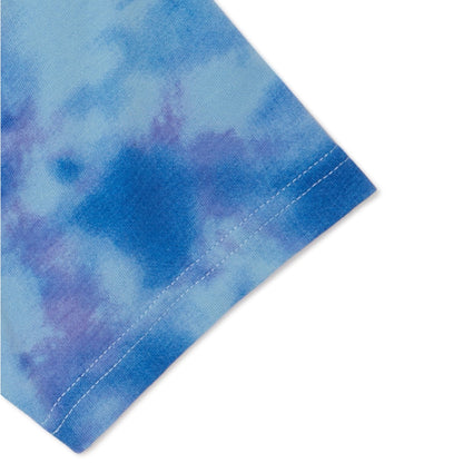 Blue and purple tie-dye fabric corner on a white background