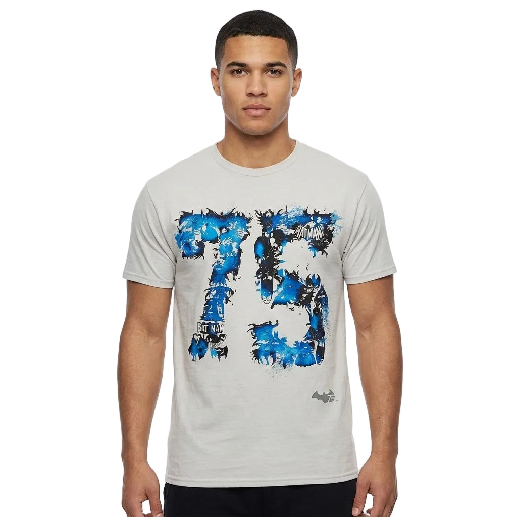 A man wearing a light gray crewneck t-shirt with a blue and black distressed graphic print of the number 75 on the front, set against a plain white background.
