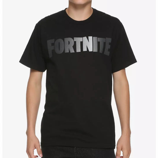 A young man wearing a black short-sleeve t-shirt with a metallic silver 'FORTNITE' logo printed across the chest, set against a plain light gray background.