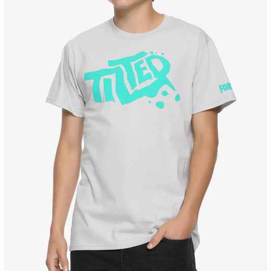 A young man wearing a light gray crewneck t-shirt with a bright turquoise 'TITLE' graphic on the chest and a small matching graphic on the sleeve, set against a plain light gray background.