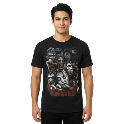 A man wearing a black crewneck t-shirt with a graphic print of zombie faces and the text 'WARNING DEAD' on the front, set against a plain white background.
