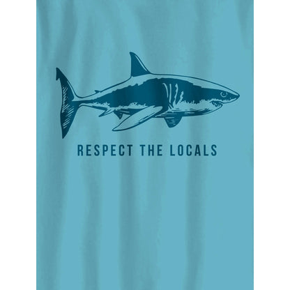 Boy wearing Wonder Nation Respect The Locals graphic T-shirt in blue, featuring bold text and casual fit.