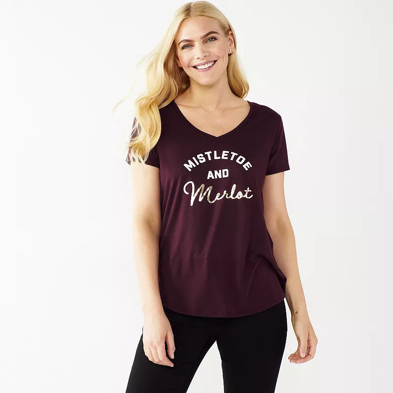 Women's holiday shirt featuring mistletoe and merlot design by Rex Distributor, Inc., with festive holiday-themed graphics.