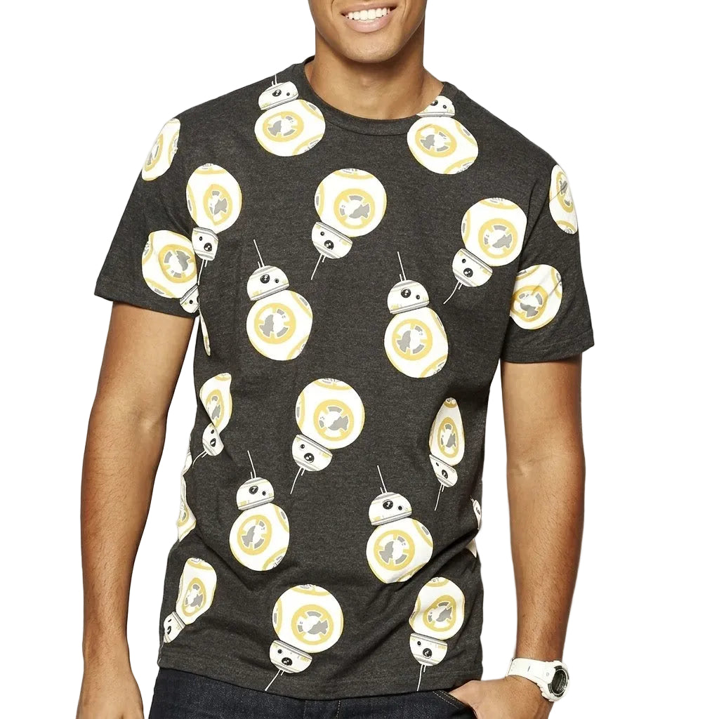A man wearing a dark gray heather t-shirt with a repeating pattern of yellow, white, and black BB-8 droid characters from Star Wars, shown against a plain white background.