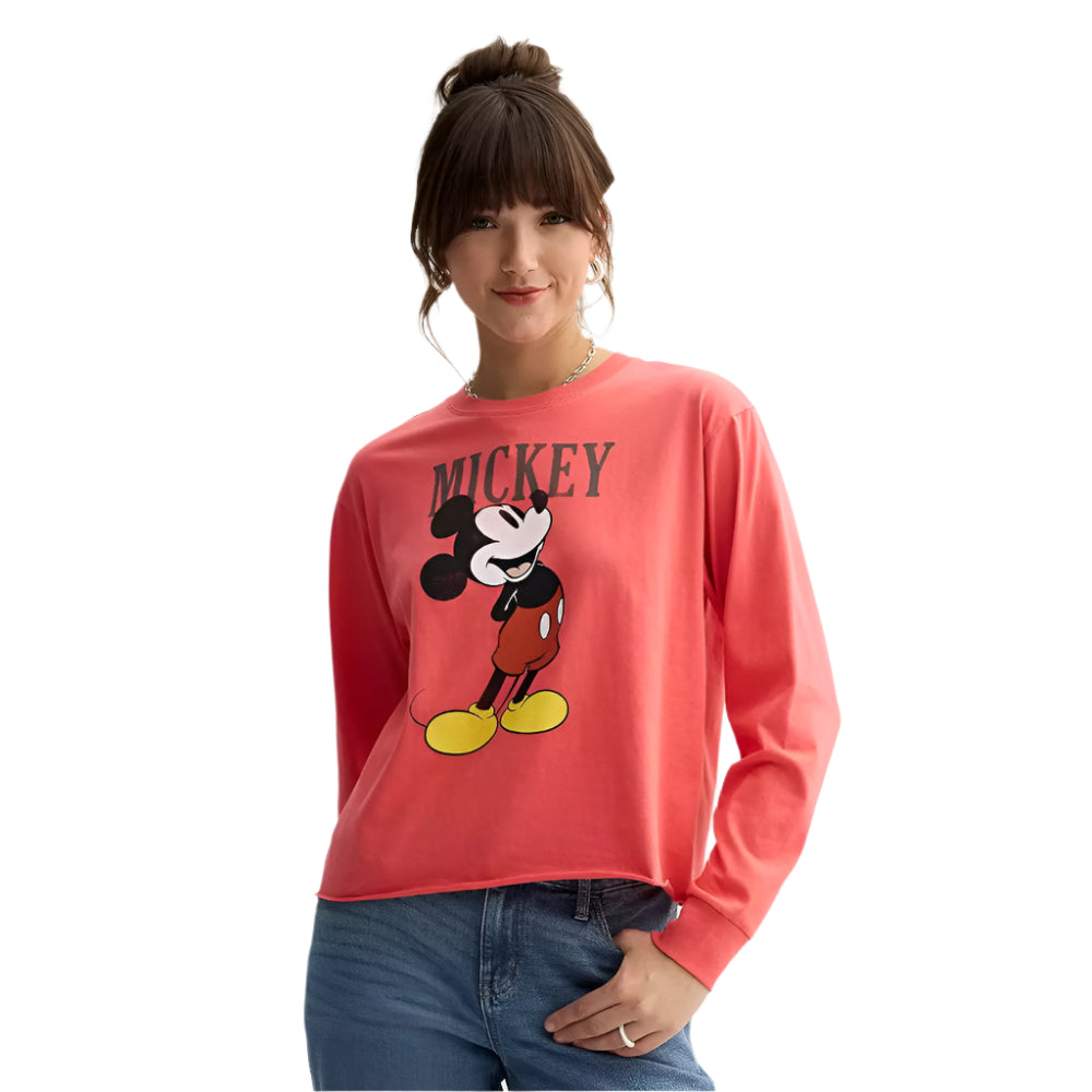 Person wearing a red 'Mickey' shirt with a white background