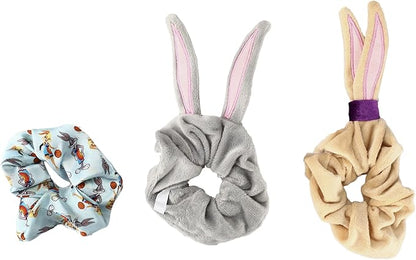 Three scrunchies with bunny ears on a white background