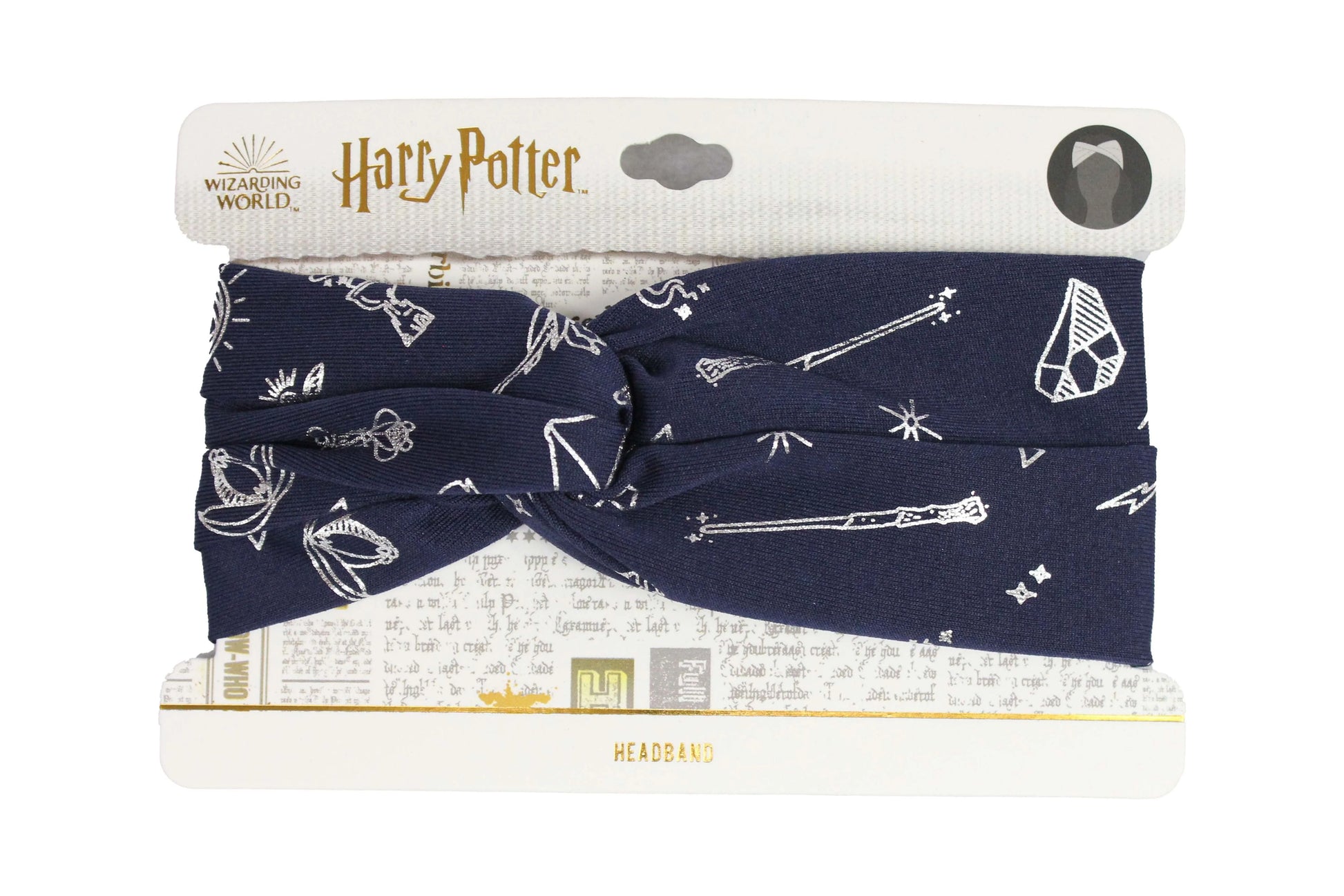 Navy blue headband with white patterns on a Harry Potter branded packaging