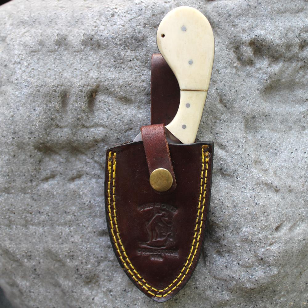 BC 793-BN 7"Bone Collector White Bone Handle Skinning Knife with Leather Sheath - Rex Distributor, Inc. Wholesale Licensed Products and T-shirts, Sporting goods,
