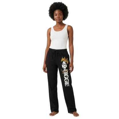 Person wearing black pants with 'BIGGIE' text and logo on a white background