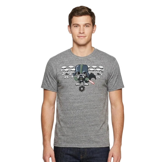 A man wearing a heather gray crewneck t-shirt with a graphic print of Star Wars characters (Stormtroopers and a Bofarress) on the chest, paired with dark blue jeans, against a light gray studio background.