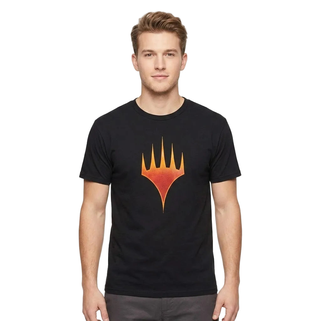 A man wearing a black crewneck t-shirt with a stylized orange and yellow flame-like graphic on the chest, set against a plain white background.