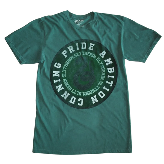 A teal green short-sleeve t-shirt with a circular graphic on the front featuring the words 'CUNNING PRIDE AMBITION' and 'SLYTHERN' in white text over a dark green background.