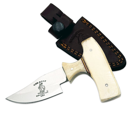 Bone Collector 5-inch white bone skinning knife with short blade and leather sheath, designed for precise game butchering.