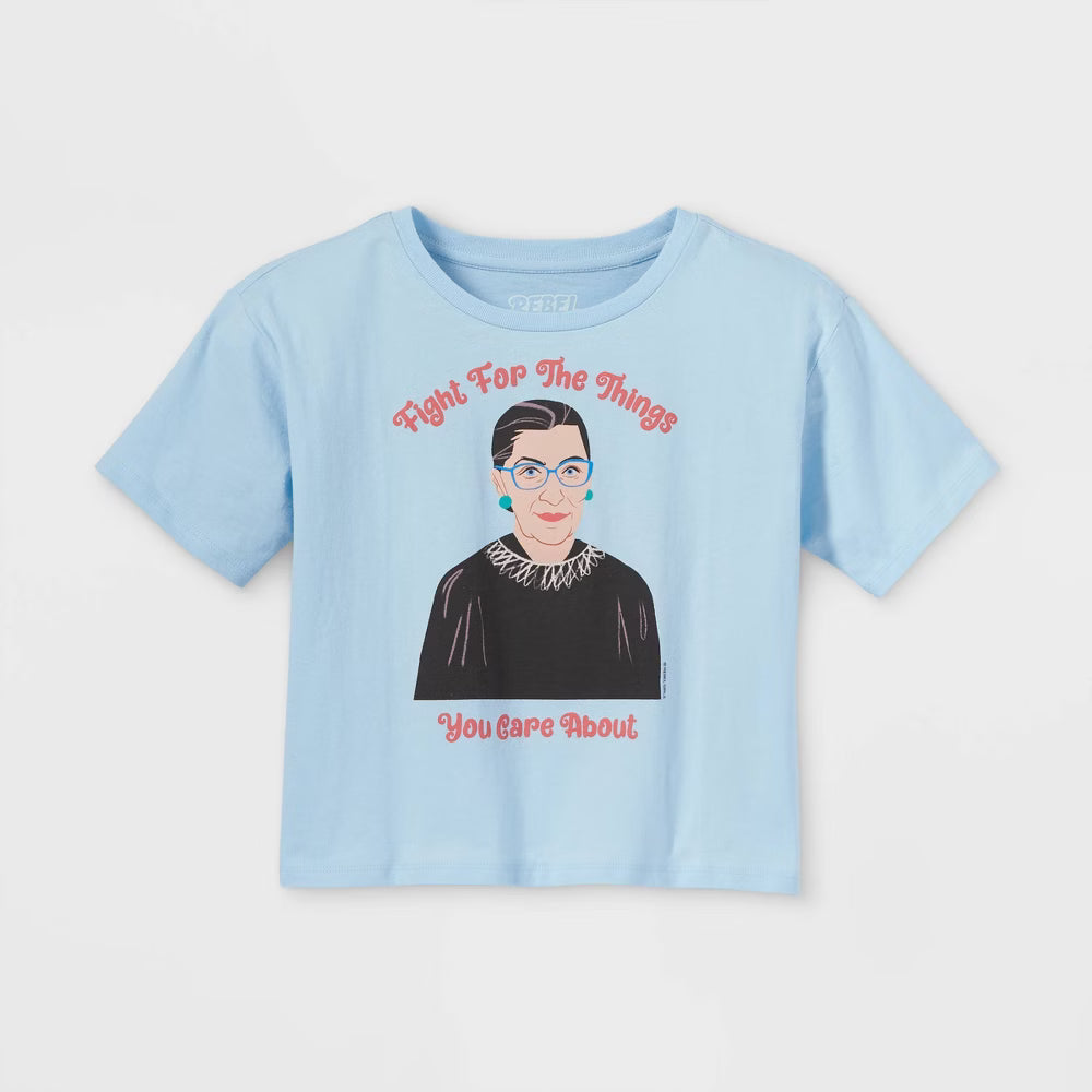 Girls' blue cropped graphic T-shirt from Mad Engine featuring short sleeves and a "Fight For Things You Care About" design.