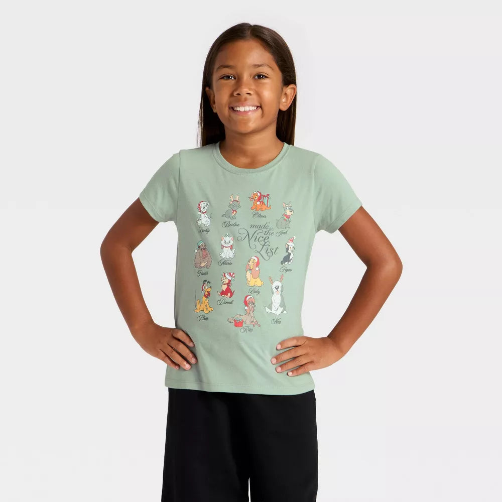 Girls' Disney Nice List graphic T-shirt by Mad Engine featuring dogs and cats holiday design in green.