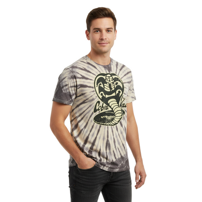Man wearing a tie-dye t-shirt with a snake logo on a white background