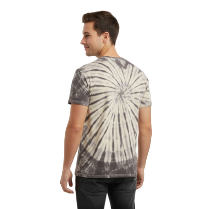 Man wearing a tie-dye t-shirt with a white and gray pattern on a plain background