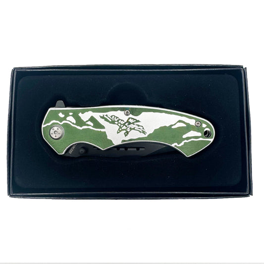 Silver and green Rex Distributor tactical folding knife with eagle design, spring-assisted mechanism, open blade, and belt clip.
