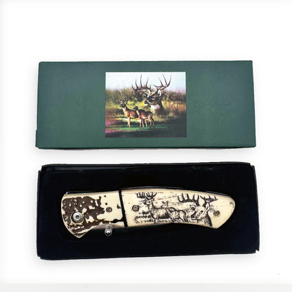 Display set of Rex Distributor's KN 1859-D 4.25-inch sketch wildlife folding knife with belt clip, shown in the image.