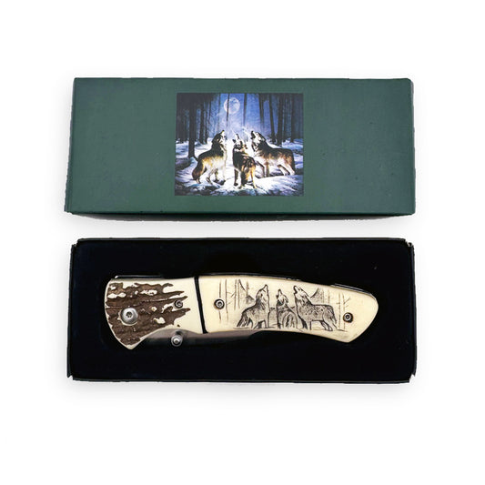 Display set of Rex Distributor's KN 1859-W 4.25-inch wildlife wolf folding knife with belt clip, featuring detailed wolf design.