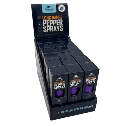 Display of long-range pepper sprays in packaging on a white background