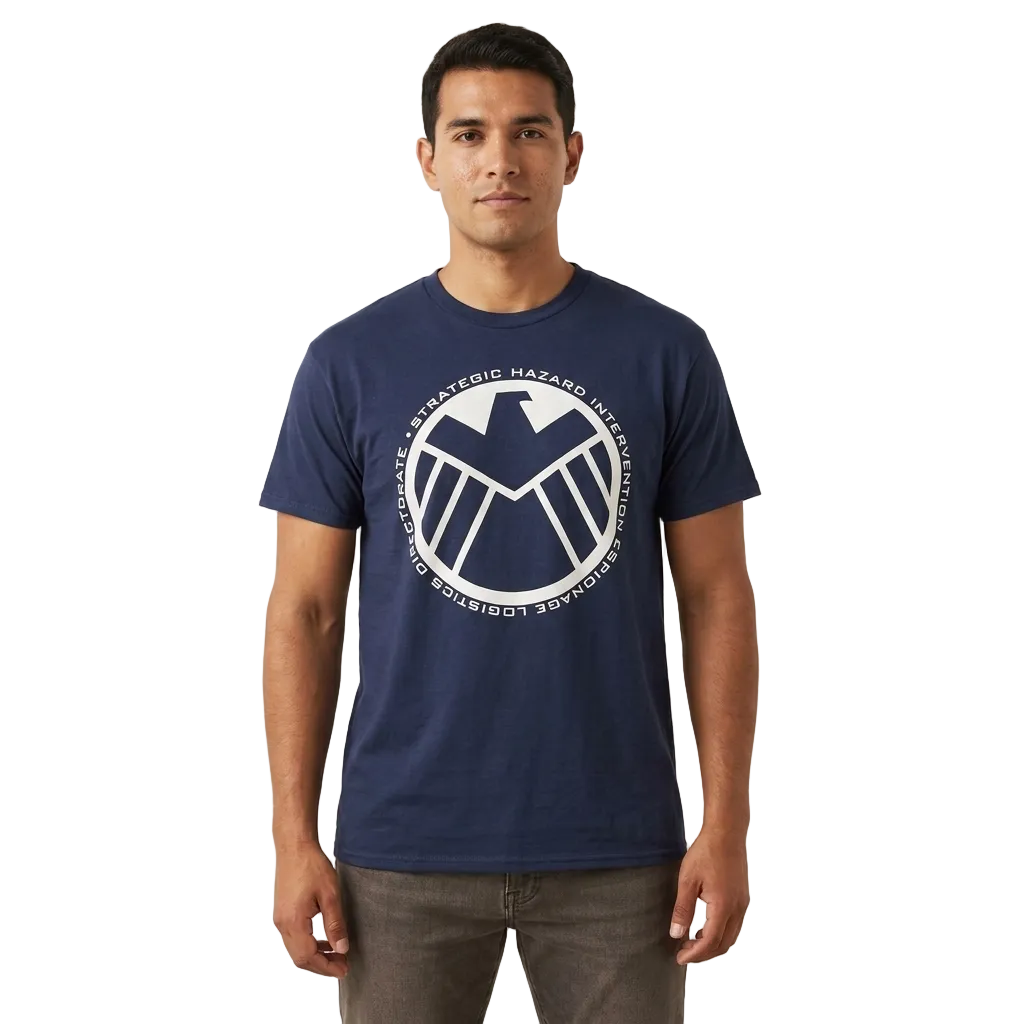 A man wearing a navy blue crewneck t-shirt with a white circular graphic of the S.H. 