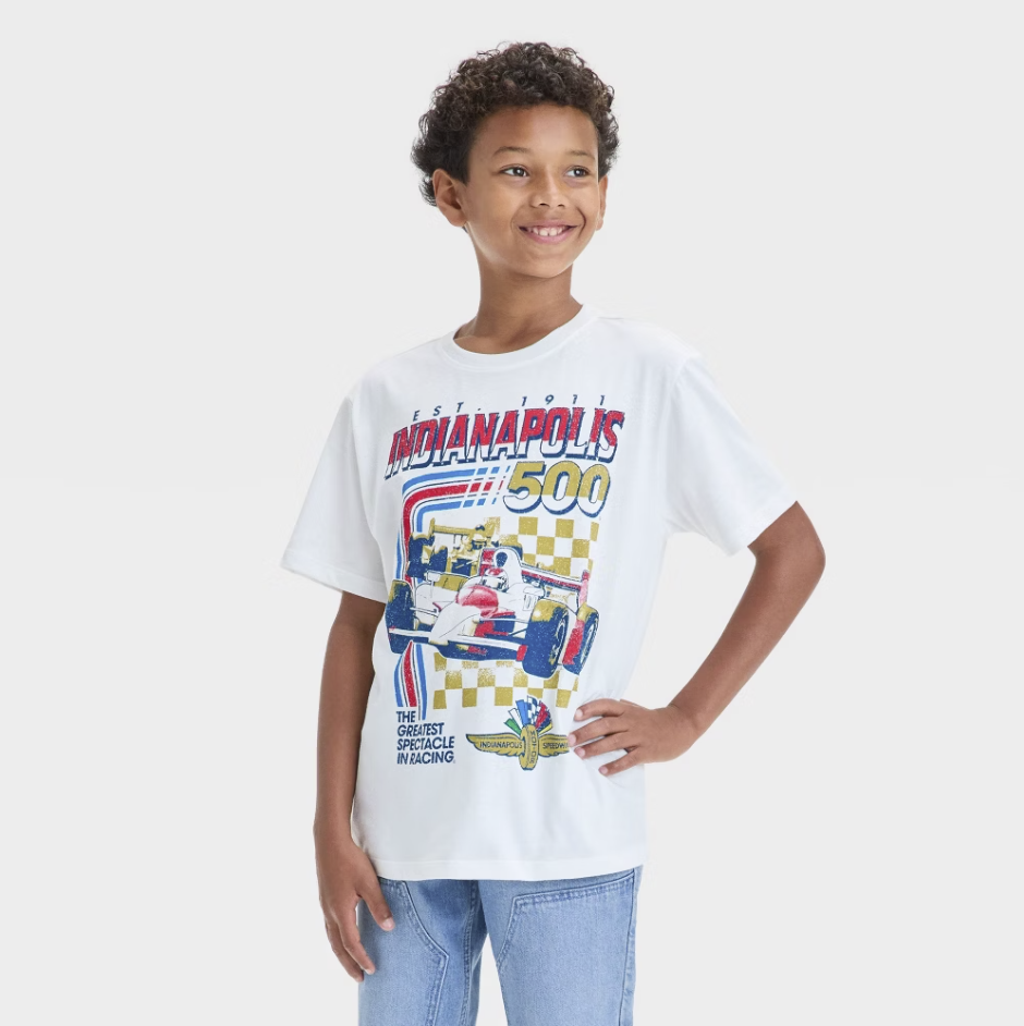 White boys' Indianapolis 500 graphic T-shirt by Mad Engine featuring race car design and bold Indianapolis 500 logo.