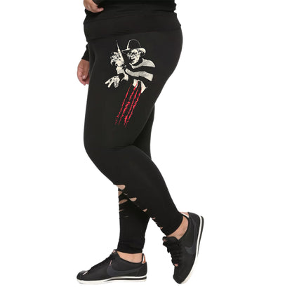 Women's Freddy Krueger leggings from A Nightmare On Elm Street by Rex Distributor, Inc. featuring spooky horror-themed design.