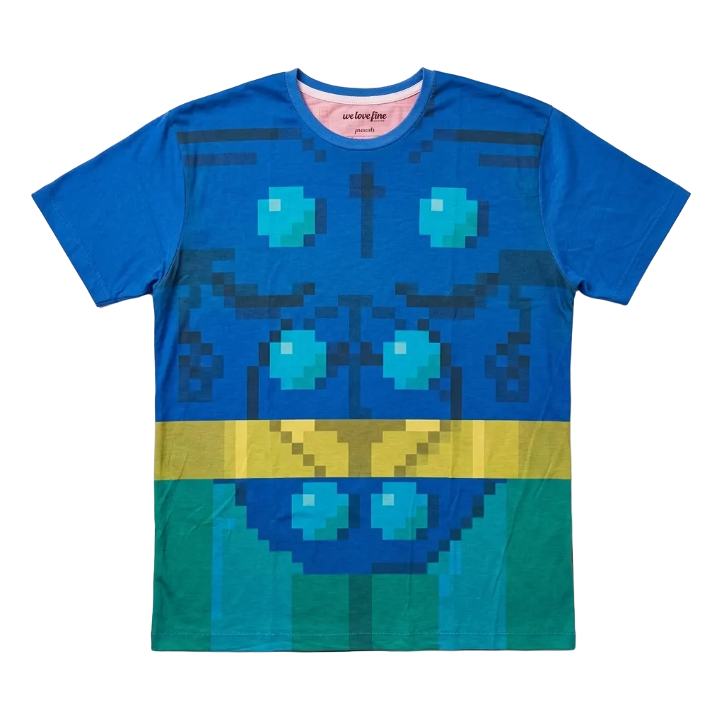 A blue short-sleeve crewneck t-shirt featuring a pixel art graphic of a stylized face with cyan eyes, a yellow nose, and a green lower section, laid flat on a light gray background.