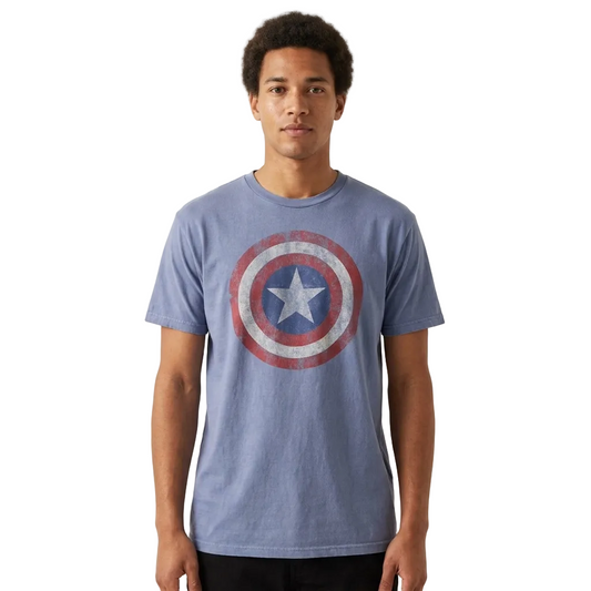 A man wearing a heathered blue crewneck t-shirt with a distressed Captain America shield graphic on the chest, standing against a plain off-white background.