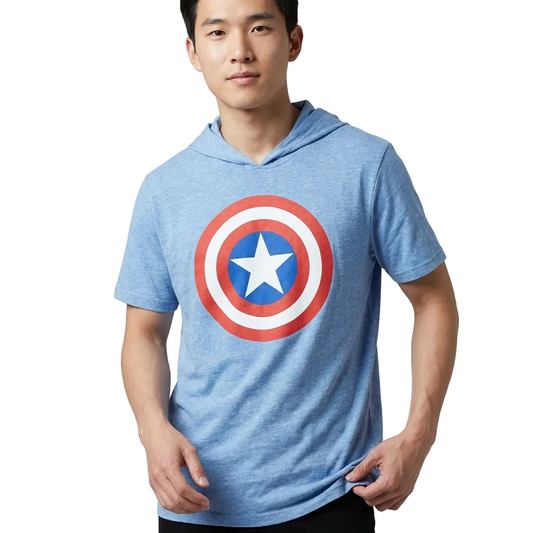 A man wearing a heather blue hooded t-shirt with a Captain America shield graphic on the chest, photographed against a neutral gray studio background.
