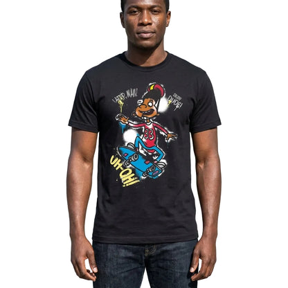 Person wearing a black t-shirt with a colorful graphic design against a light gray wall.