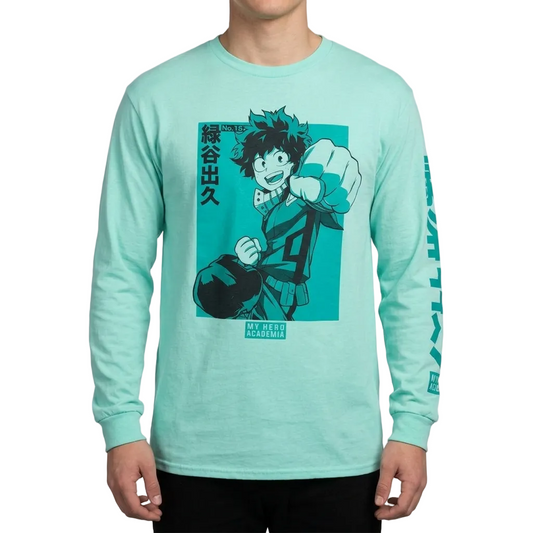 A person wearing a mint green long-sleeve t-shirt with a large anime graphic on the front and vertical text on the sleeve, paired with black pants against a white background.