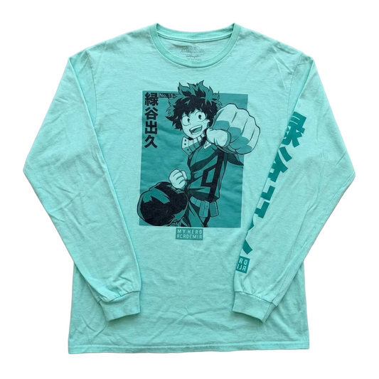 A light mint green long-sleeve t-shirt featuring a large anime graphic of Deku Midoriya from My Hero Academia on the front, with vertical Japanese text printed down the right sleeve, laid flat on a neutral gray background.