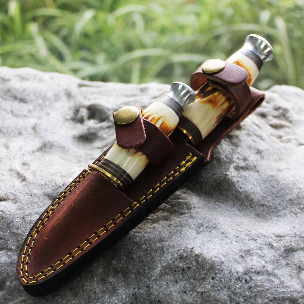 Bone Collector BC 815 hunting knife set with 8.5-inch and 4.5-inch knives in leather sheath, featuring durable blades and ergonomic handles.