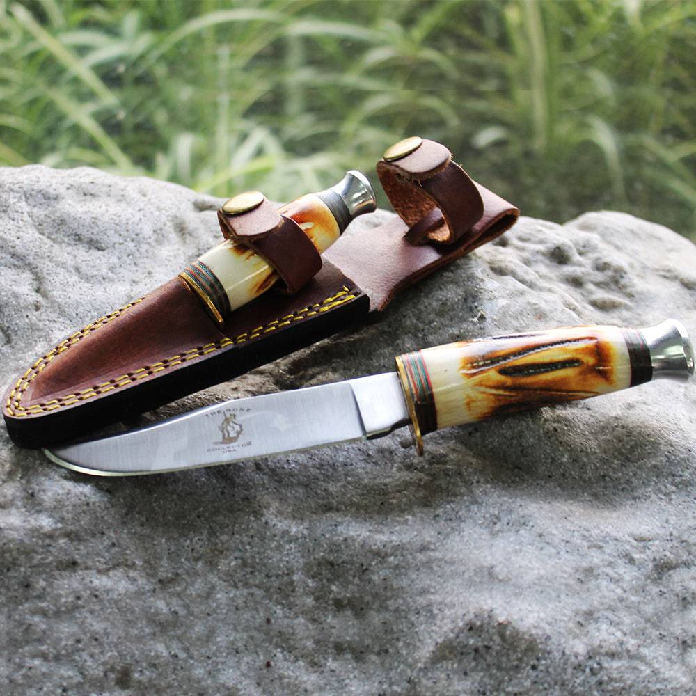 Bone Collector BC 815 two-piece hunting knife set with 8.5-inch and 4.5-inch knives and leather sheath for outdoor use.