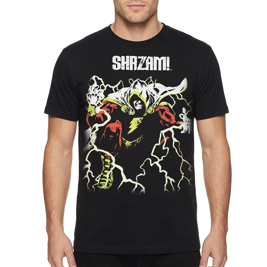 A man wearing a black short-sleeve t-shirt with a graphic of Shazam! and the word 'SHAZAM!' printed on the chest, set against a plain white background.