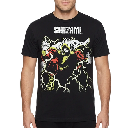 A man wearing a black short-sleeve t-shirt with a graphic of Shazam! and the word 'SHAZAM!' printed on the chest, set against a plain white background.