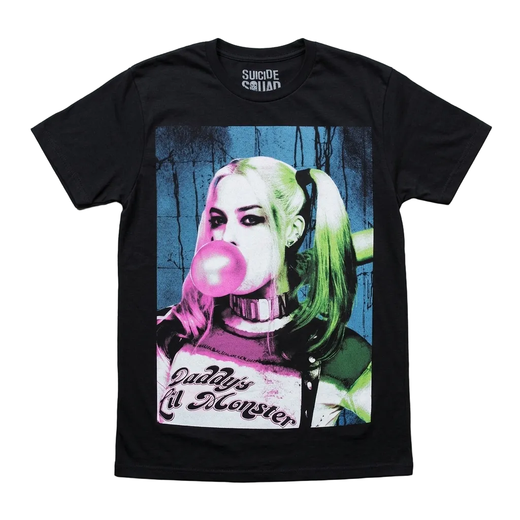A black short-sleeve graphic t-shirt featuring a stylized pop-art print of Harley Quinn from Suicide Squad blowing a pink bubblegum bubble. The graphic includes the text 'Daddy's Kill Monster' and 'SUICIDE SQUAD' printed inside the collar.