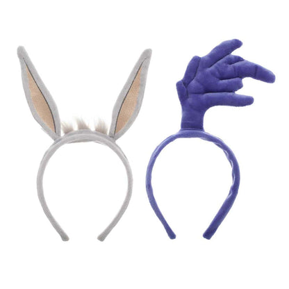 Two headbands with bunny ears and a purple hand design on a white background