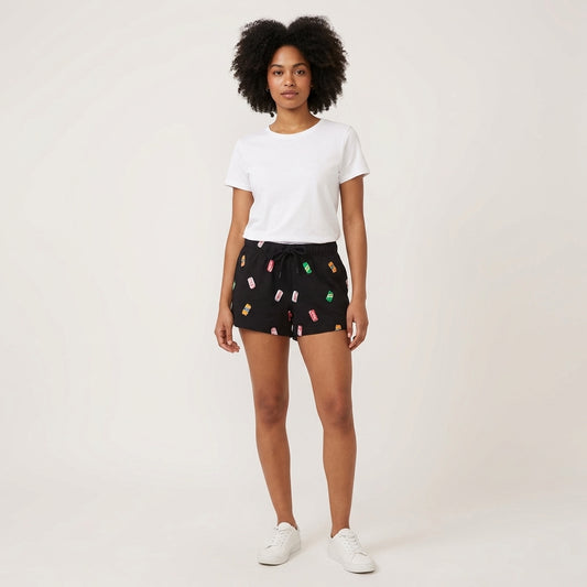 Women's black Coca-Cola soda cans sleep shorts by Bioworld, featuring a comfortable design with Coca-Cola-themed print.