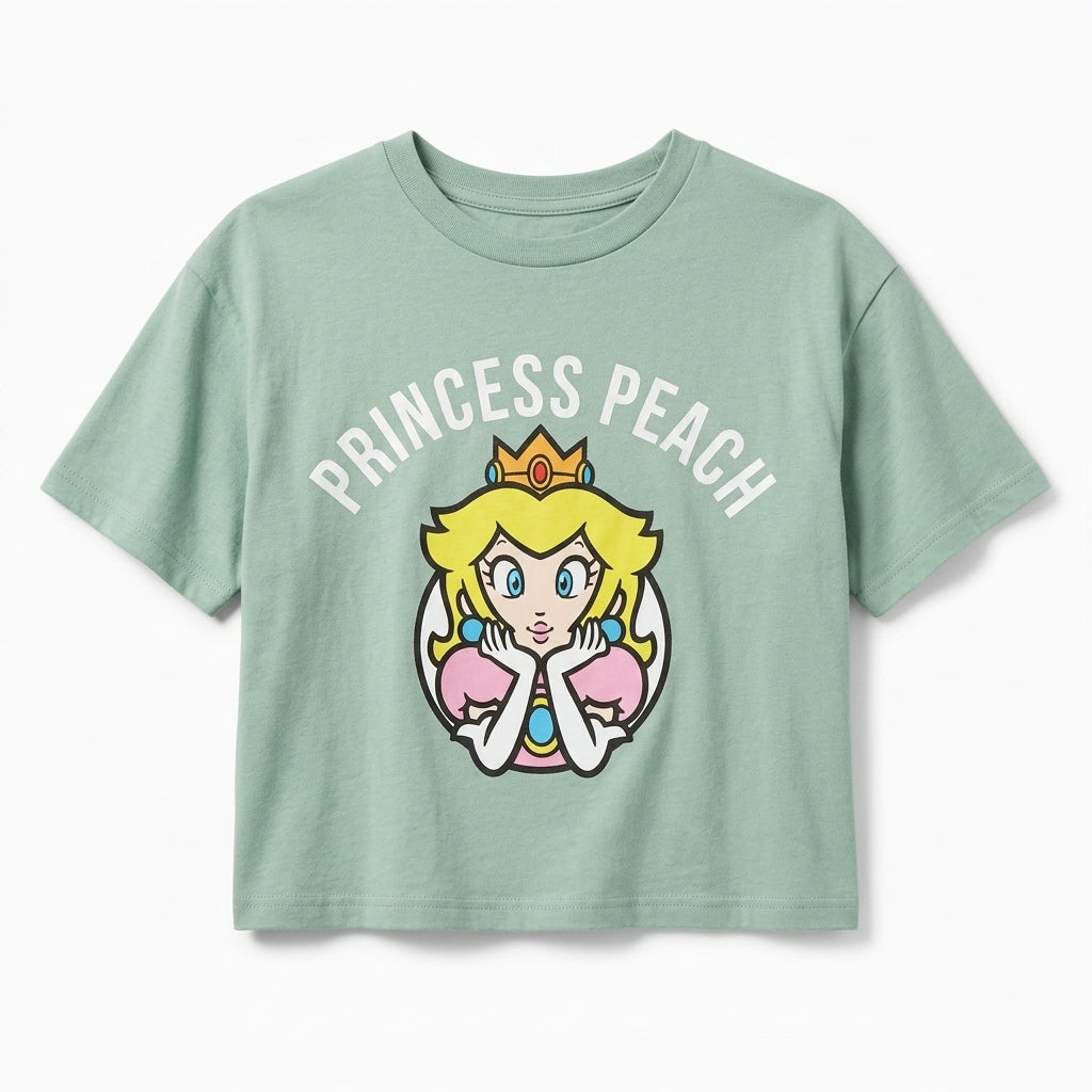 Light green princess peach graphic t-shirt for women by Mad Engine, featuring Super Mario design on a casual shirt.