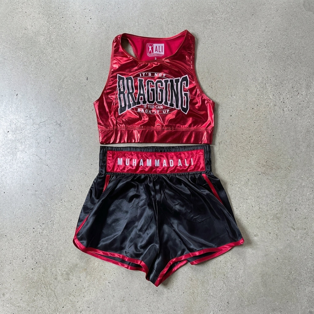 Women junior's Muhammad Ali boxing costume featuring a red tank top and matching shorts from Rex Distributor, Inc.